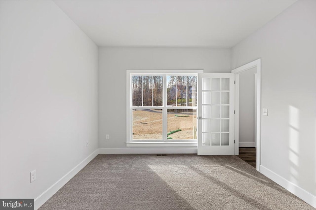 6741 Ginseng Ln, King George, VA 22485 - empty room with carpet floors and baseboards