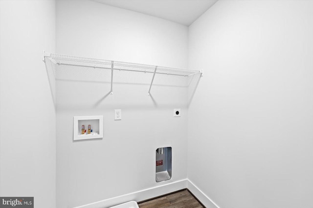 6741 Ginseng Ln, King George, VA 22485 - clothes washing area with dark wood-type flooring, baseboards, washer hookup, and electric dryer hookup