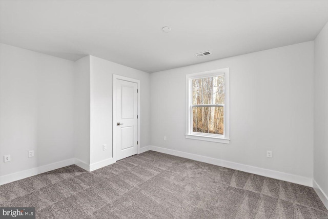 6741 Ginseng Ln, King George, VA 22485 - carpeted spare room with baseboards
