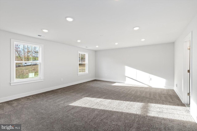 6741 Ginseng Ln, King George, VA 22485 - carpeted spare room featuring plenty of natural light, baseboards, and recessed lighting