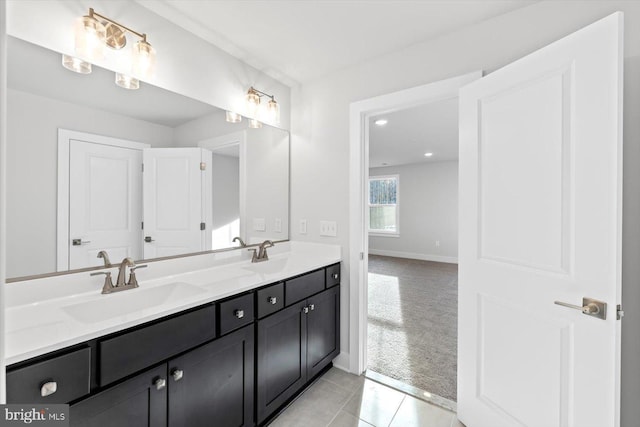 6741 Ginseng Ln, King George, VA 22485 - full bathroom featuring double vanity, tile patterned flooring, baseboards, and recessed lighting