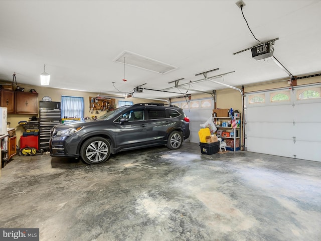 garage featuring a garage door opener