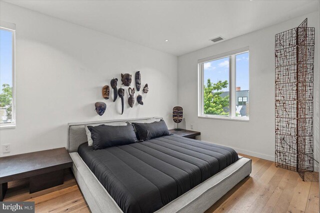 1932 9th St NW Unit R402, Washington, DC 20001 - bedroom featuring hardwood / wood-style floors and baseboards