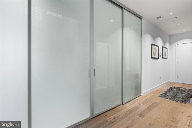 1932 9th St NW Unit R402, Washington, DC 20001 - hallway with wood-type flooring, recessed lighting, and baseboards