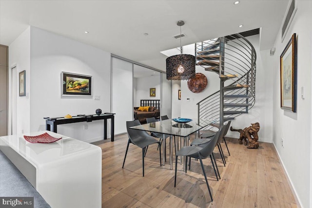 1932 9th St NW Unit R402, Washington, DC 20001 - dining space with stairway, light wood-style floors, baseboards, and recessed lighting
