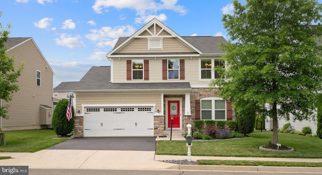 craftsman-style home with stone siding, asphalt driveway, and a front lawn