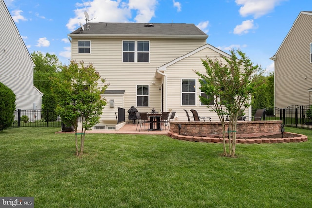rear view of house with a patio area