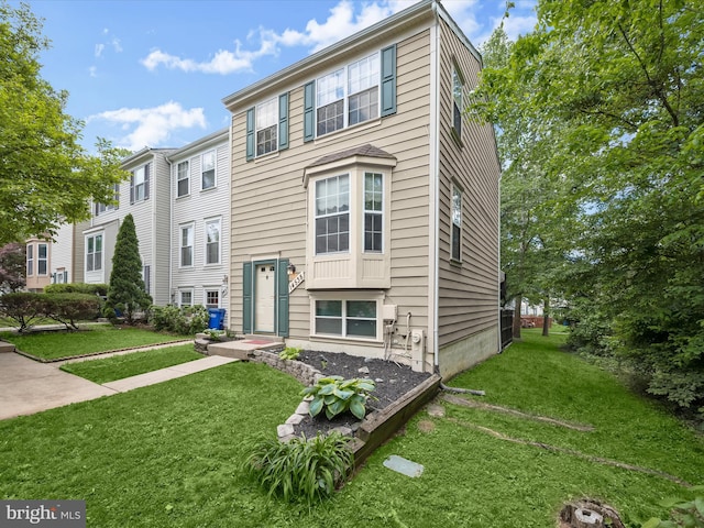 view of front of property with a front lawn