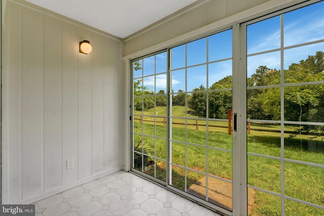 12106 Green Leaf Ct Unit 102, Fairfax, VA 22033 - unfurnished sunroom with view of scattered trees