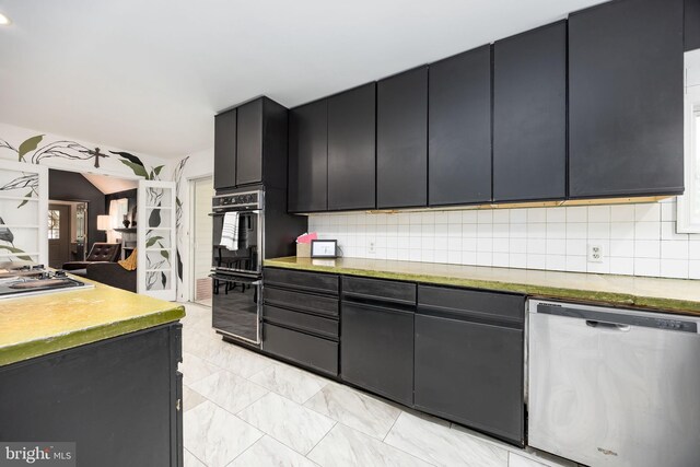 26882 Pratt Rd, Salisbury, MD 21801 - kitchen featuring dishwasher, dark cabinets, cooktop, and backsplash