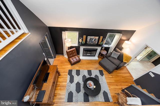 26882 Pratt Rd, Salisbury, MD 21801 - living room with wood finished floors and a tiled fireplace