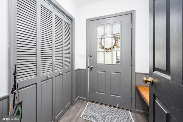 26882 Pratt Rd, Salisbury, MD 21801 - doorway to outside featuring wainscoting and light wood-style floors