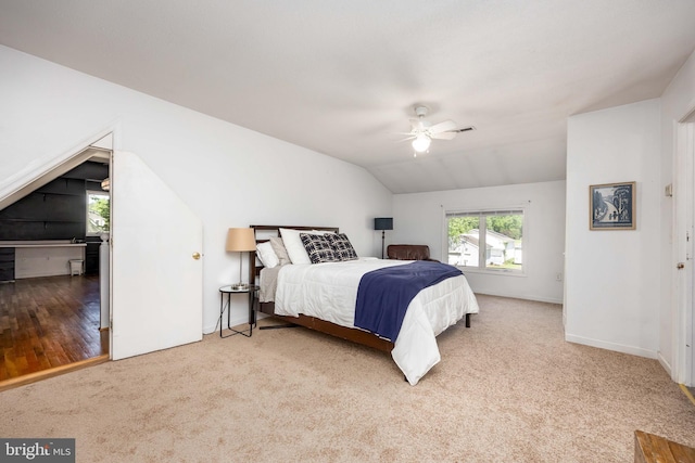 26882 Pratt Rd, Salisbury, MD 21801 - bedroom with lofted ceiling, carpet floors, multiple windows, a ceiling fan, and baseboards