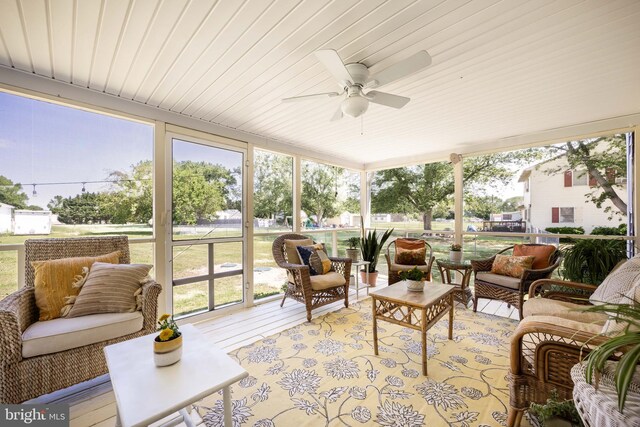 26882 Pratt Rd, Salisbury, MD 21801 - sunroom featuring ceiling fan and an outdoor hangout area