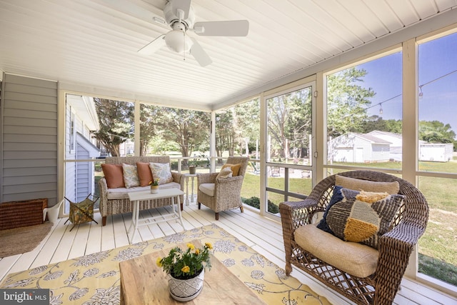 26882 Pratt Rd, Salisbury, MD 21801 - sunroom featuring plenty of natural light, a ceiling fan, and an outdoor hangout area