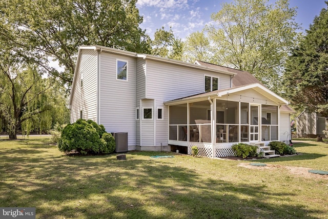 26882 Pratt Rd, Salisbury, MD 21801 - back of property featuring a sunroom, a yard, and central AC