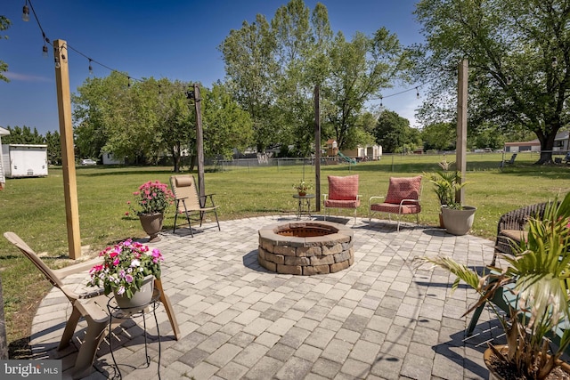 26882 Pratt Rd, Salisbury, MD 21801 - view of patio / terrace featuring an outdoor fire pit