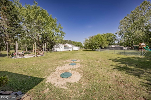 26882 Pratt Rd, Salisbury, MD 21801 - view of yard with a playground and a patio