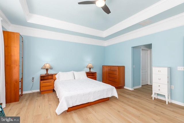 111 Central Parke E, Ocean Pines, MD 21811 - bedroom with a raised ceiling, wood finished floors, ornamental molding, and baseboards