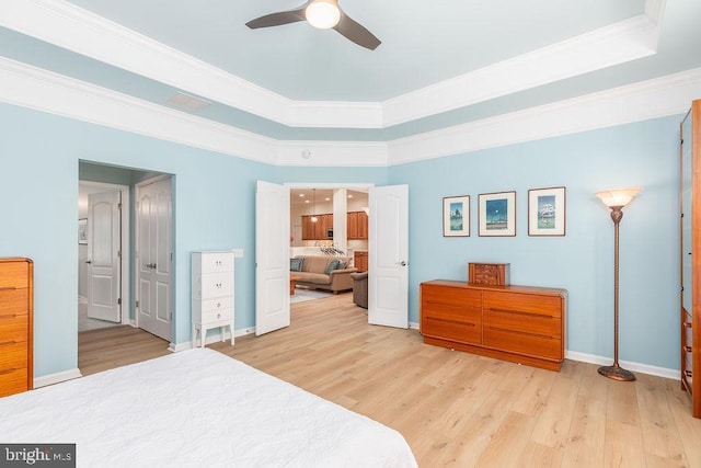 111 Central Parke E, Ocean Pines, MD 21811 - bedroom with wood finished floors, ornamental molding, baseboards, a tray ceiling, and ceiling fan