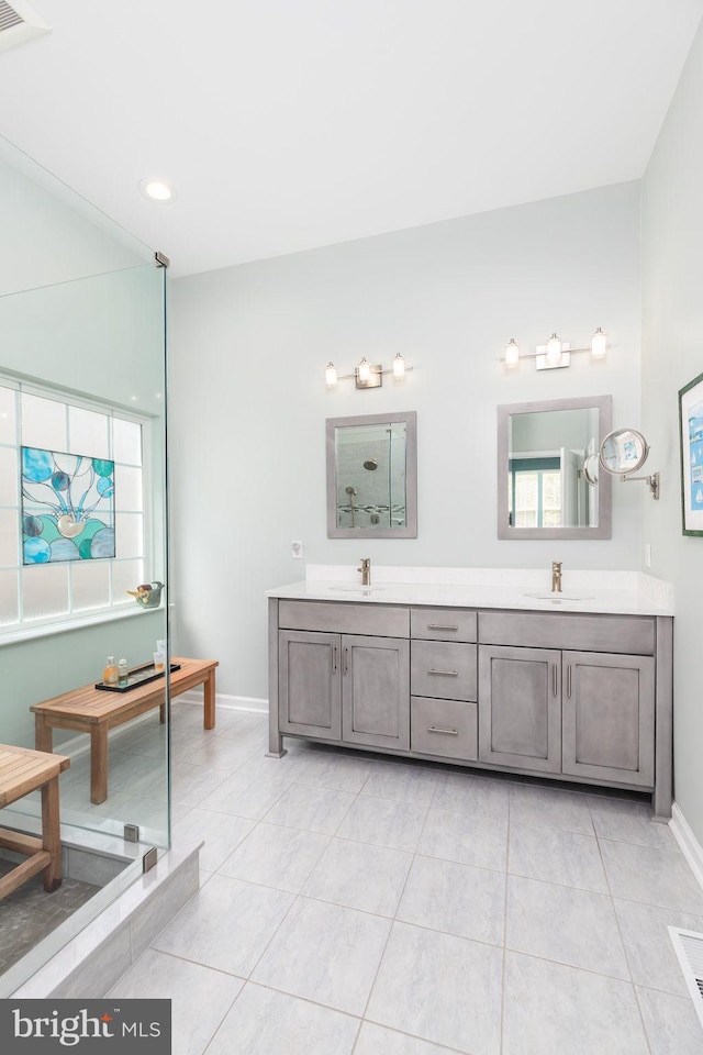 111 Central Parke E, Ocean Pines, MD 21811 - full bath featuring tile patterned floors, baseboards, double vanity, and a shower