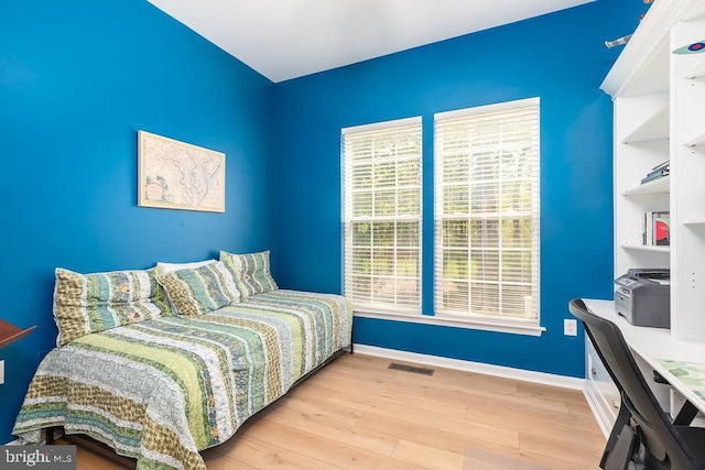 111 Central Parke E, Ocean Pines, MD 21811 - bedroom featuring wood finished floors, baseboards, and a desk