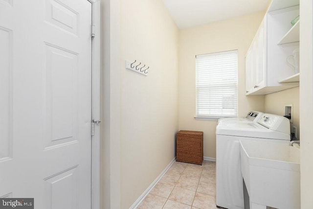 111 Central Parke E, Ocean Pines, MD 21811 - washroom featuring cabinet space, independent washer and dryer, baseboards, and light tile patterned floors