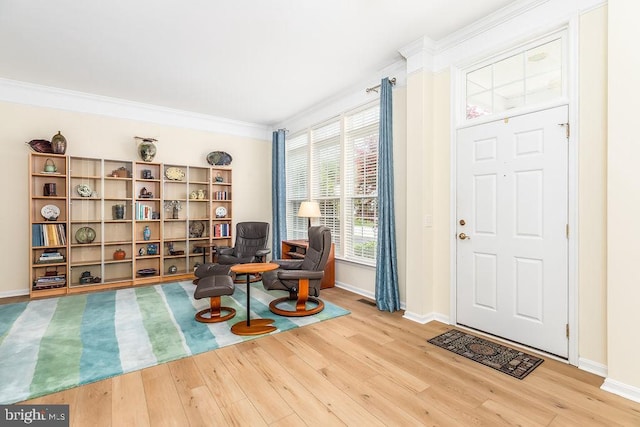 111 Central Parke E, Ocean Pines, MD 21811 - sitting room featuring baseboards, wood finished floors, and ornamental molding