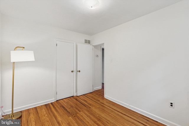 129 Kreutz Ave, Doylestown, PA 18901 - unfurnished bedroom featuring wood finished floors and baseboards