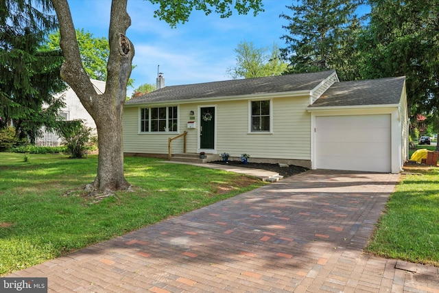 129 Kreutz Ave, Doylestown, PA 18901 - ranch-style house with a front yard, a garage, decorative driveway, and a chimney