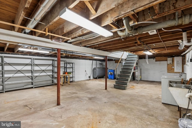 129 Kreutz Ave, Doylestown, PA 18901 - unfinished basement with oil tank, washer / clothes dryer, stairway, and water heater