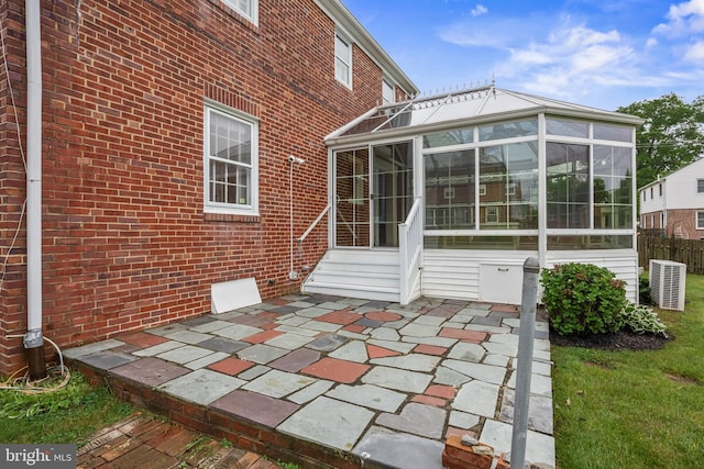 view of patio / terrace with a sunroom