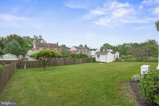 view of yard featuring a residential view
