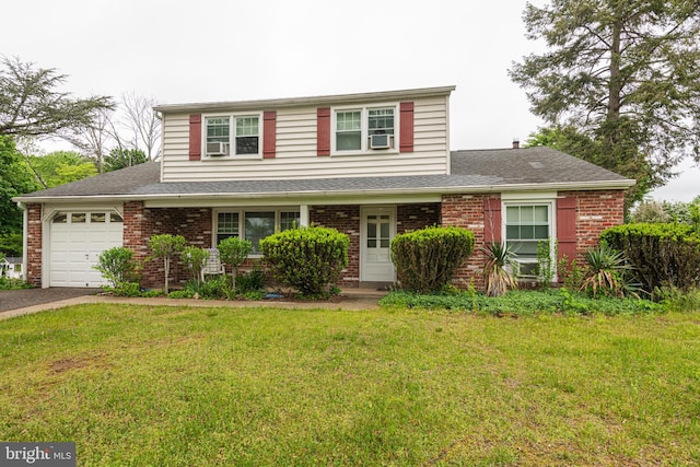 traditional-style house with an attached garage, brick siding, a front lawn, driveway, and a shingled roof