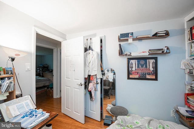 bedroom with light wood-type flooring