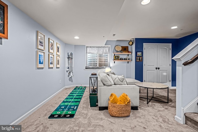 living area featuring carpet flooring, recessed lighting, baseboards, and stairs