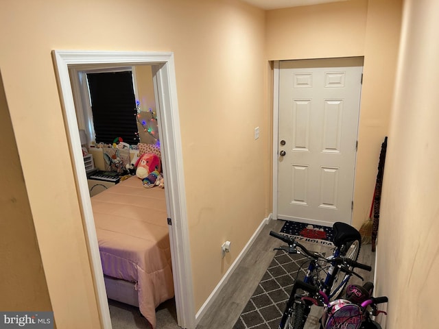 402 Market St, Marcus Hook, PA 19061 - doorway to outside with wood finished floors and baseboards