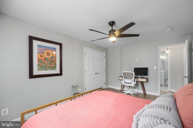 bedroom with wood finished floors, baseboards, a closet, and ceiling fan