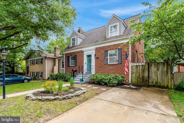 2914 6th St S, Arlington, VA 22204 - cape cod-style house featuring brick siding and roof with shingles