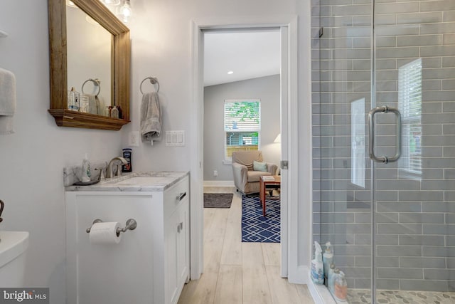 2914 6th St S, Arlington, VA 22204 - ensuite bathroom with a shower stall, vanity, wood finished floors, and toilet
