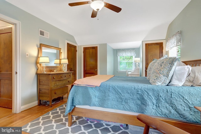 2914 6th St S, Arlington, VA 22204 - bedroom with wood finished floors, vaulted ceiling, baseboards, and ceiling fan