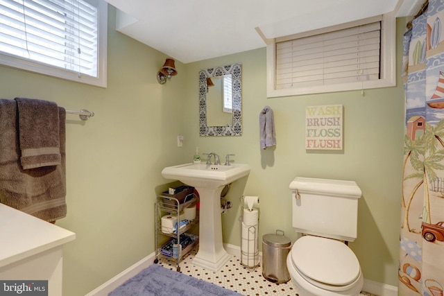 2914 6th St S, Arlington, VA 22204 - bathroom featuring baseboards and toilet