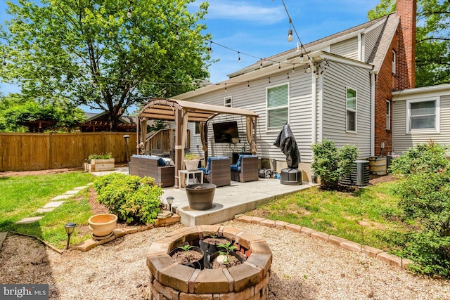 2914 6th St S, Arlington, VA 22204 - back of house with a gazebo, an outdoor living space with a fire pit, a patio area, a chimney, and central air condition unit