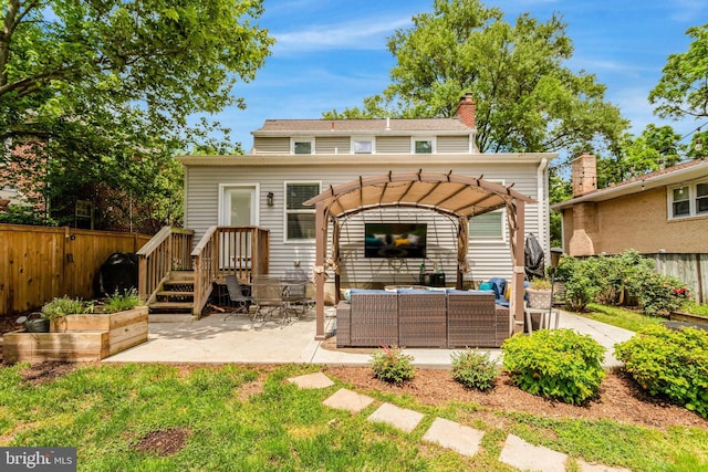 2914 6th St S, Arlington, VA 22204 - back of property with an outdoor living space, fence, a chimney, a patio area, and a pergola