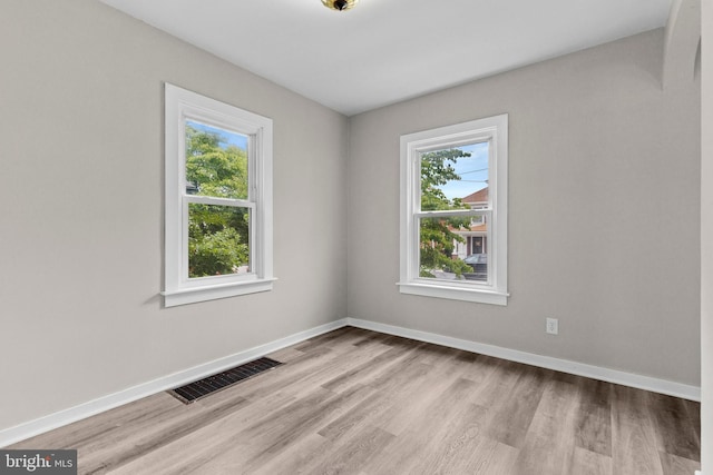 537 Baer Ave, Hanover, PA 17331 - empty room with healthy amount of natural light, wood finished floors, and baseboards