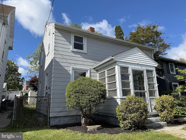 537 Baer Ave, Hanover, PA 17331 - rear view of property featuring a sunroom and a chimney