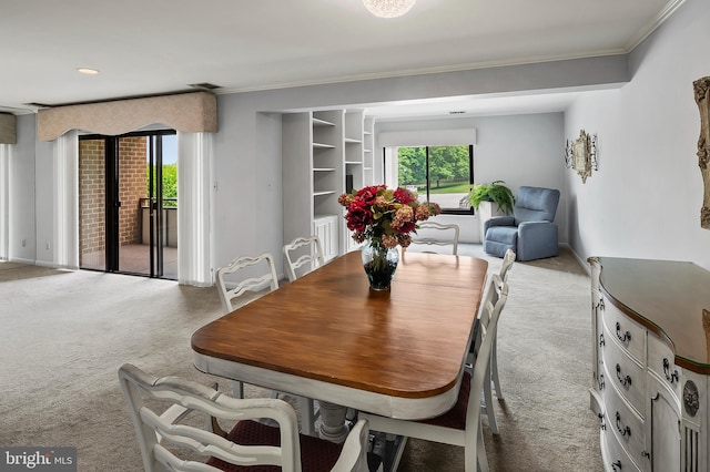 2 High Stepper Ct Unit 201, Baltimore, MD 21208 - carpeted dining room featuring crown molding and baseboards