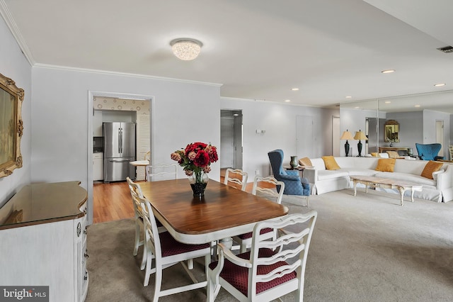 2 High Stepper Ct Unit 201, Baltimore, MD 21208 - dining room featuring crown molding and light wood-type flooring