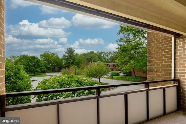 2 High Stepper Ct Unit 201, Baltimore, MD 21208 - balcony featuring view of wooded area