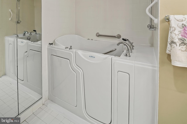 2 High Stepper Ct Unit 201, Baltimore, MD 21208 - full bath featuring tile patterned floors and a bathtub